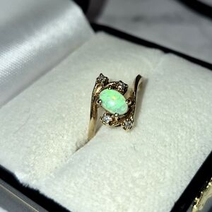 Elegant Gold Opal Ring with Diamond Accents